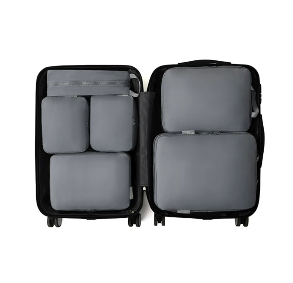 compression travel bag with six large storage pockets, gray. (sample).